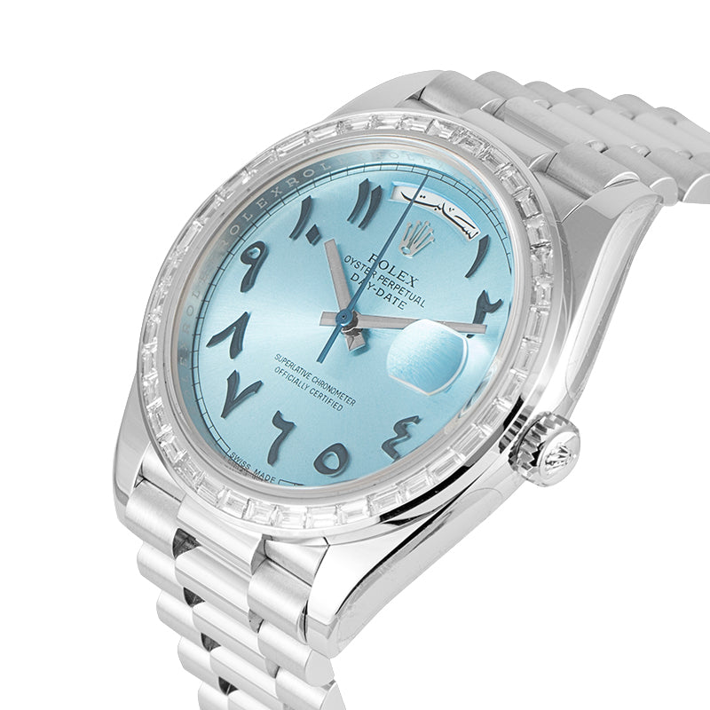 Crown side of the Day-Date 228206 custom ice-blue dial with Eastern-Arabic numerals and custom diamond bezel