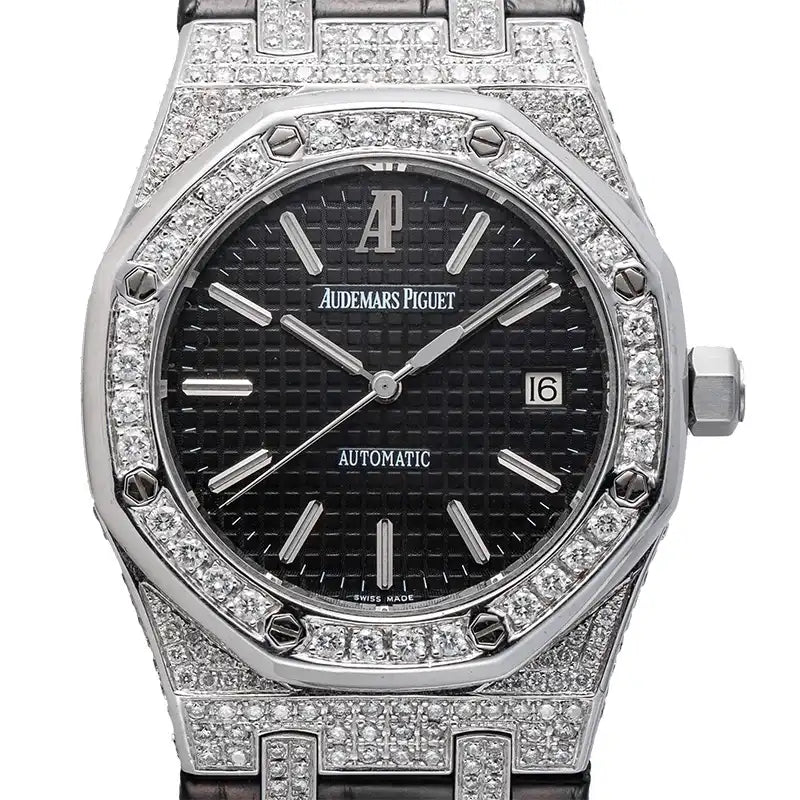 Close up of the Custom diamond-set Audemars Piguet Royal Oak 15300 with black dial, diamond bezel, and black leather strap.