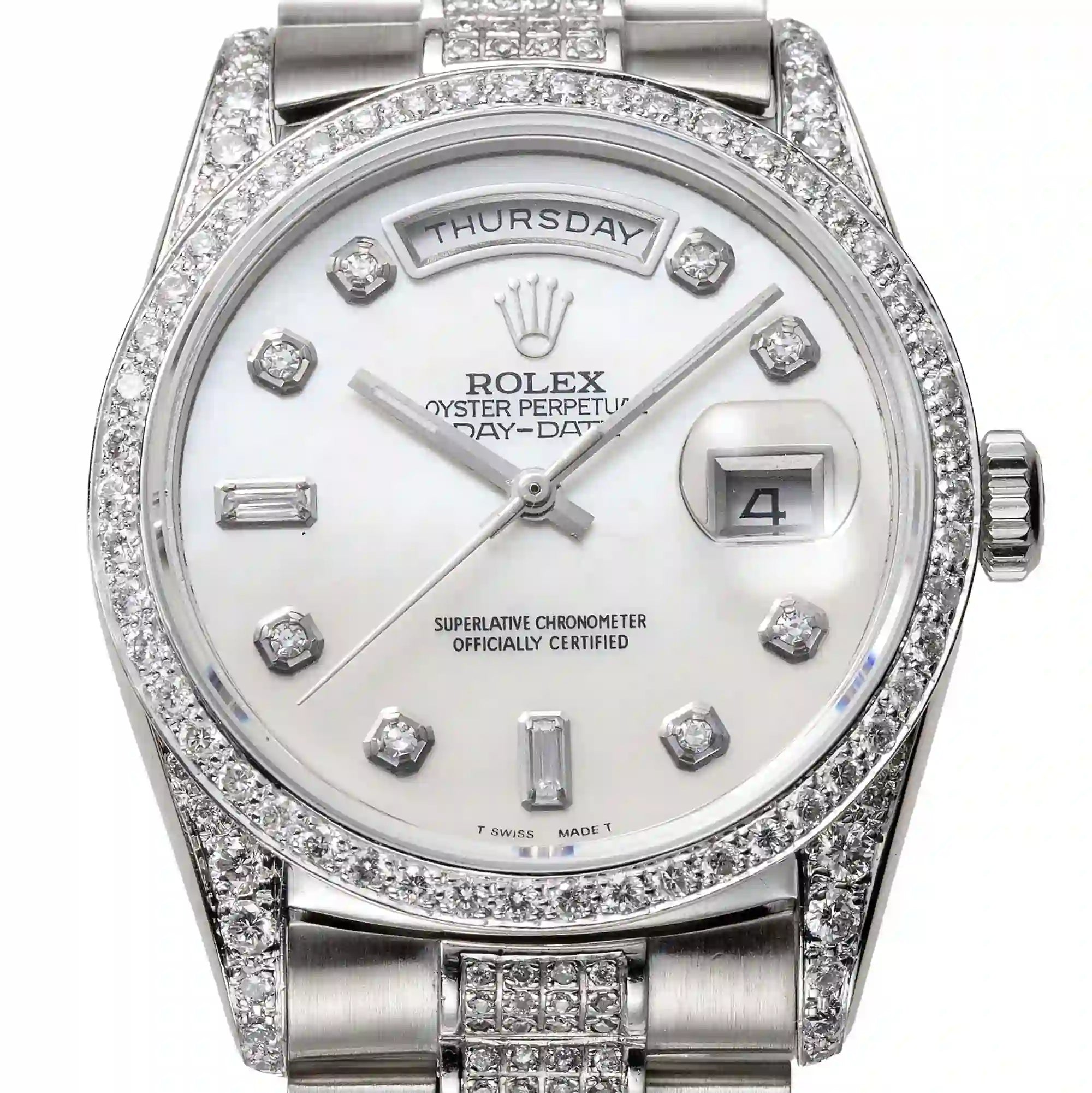 Close up - Rolex Day-Date 36 White Gold Watch MOP dial with applied diamond numerlas, lugs, bezel.