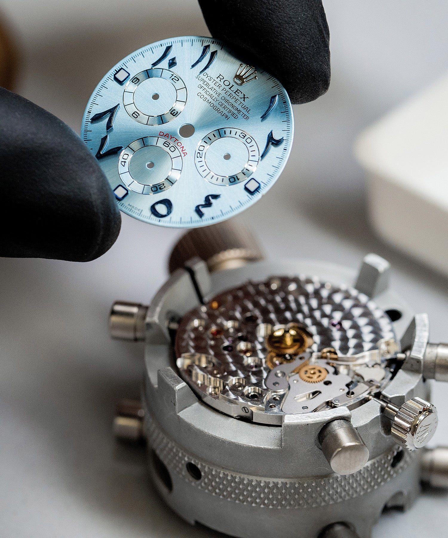 Our experienced Watchmaker fitting a custom dial