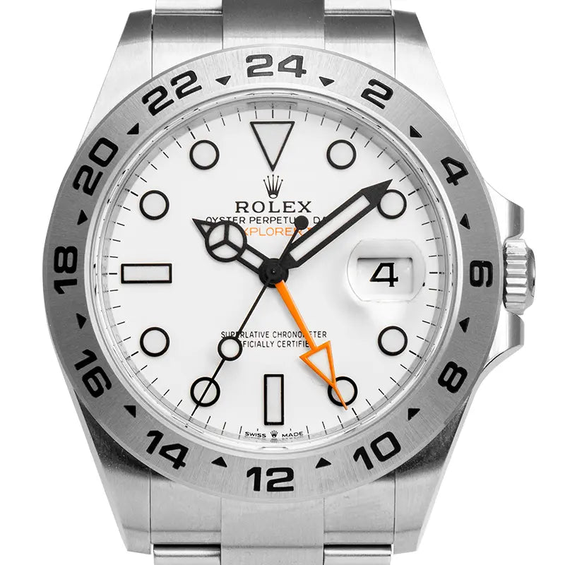 Close up of the Rolex Explorer II 226570 with white dial and stainless steel bracelet.