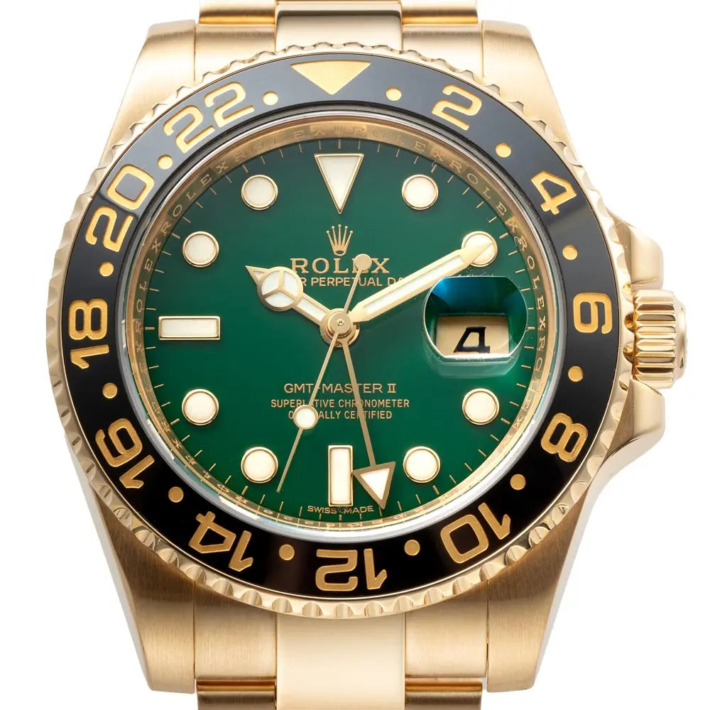 Close up of the Rolex GMT-Master II in 18ct Yellow Gold with a Green Dial ref. 116718LN