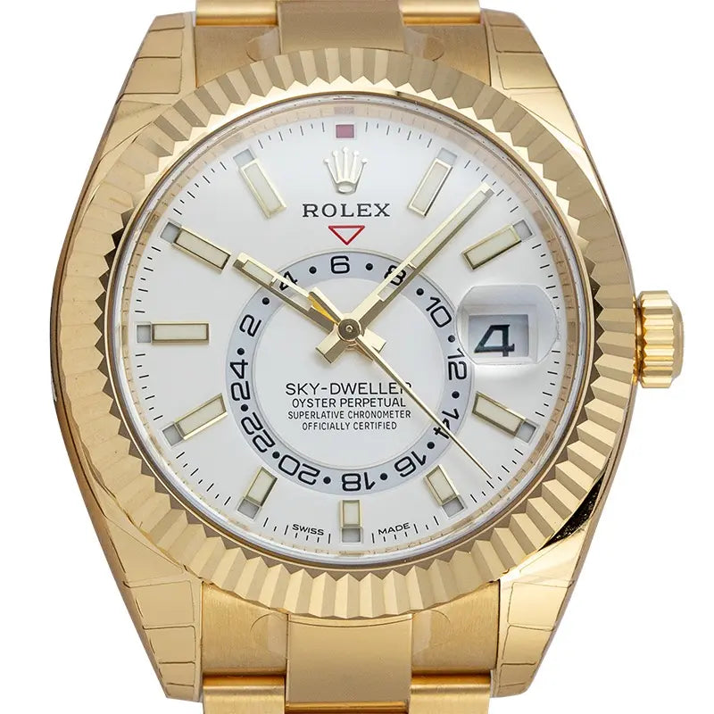Close up of the Rolex Sky-Dweller 18ct yellow gold watch with white dial, model 326938.