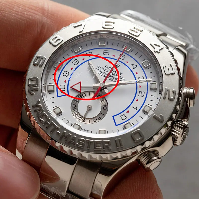 Image showing a scratch on the crystal of the Rolex Yacht-Master II 116689 in 18ct white gold with white dial and regatta countdown bezel.