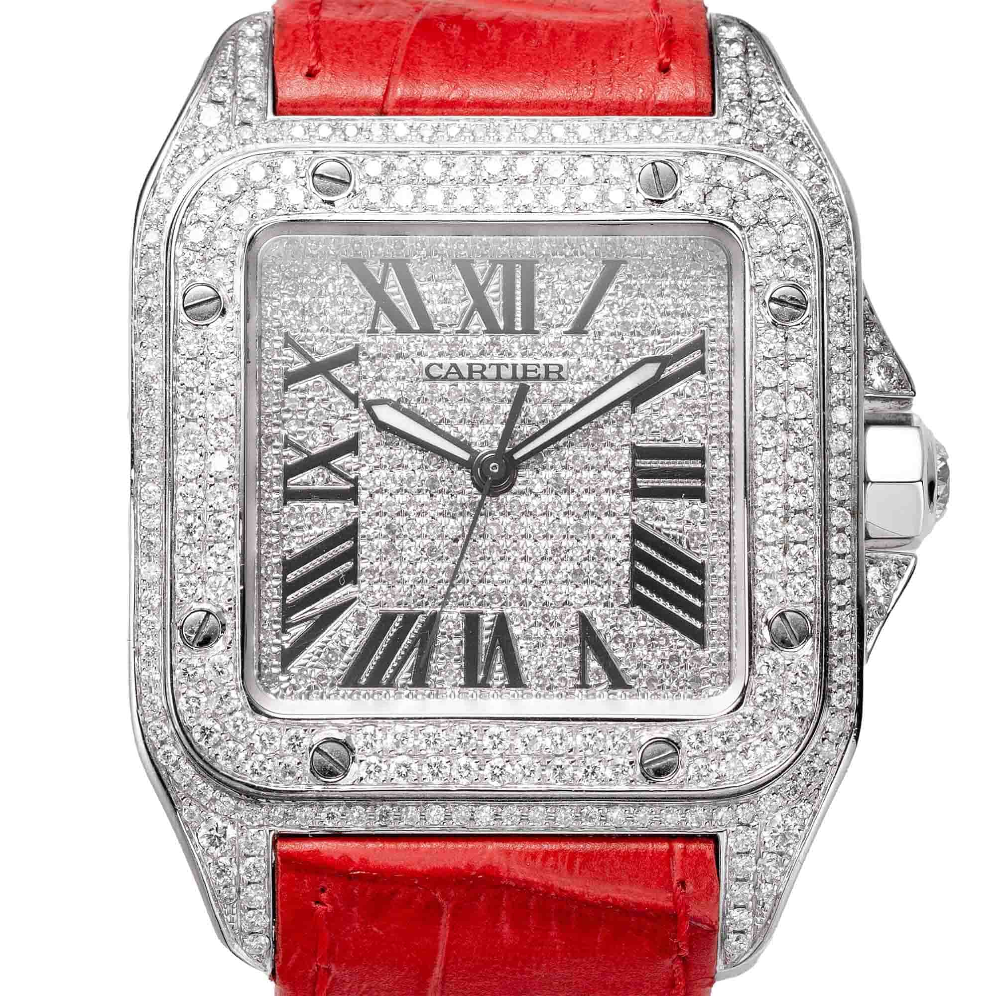 Close up of the Cartier Santos 100 Large Watch reference W20073X8 in steel with Diamond Set case, bezel, diamond paved dial and Red Leather Strap.