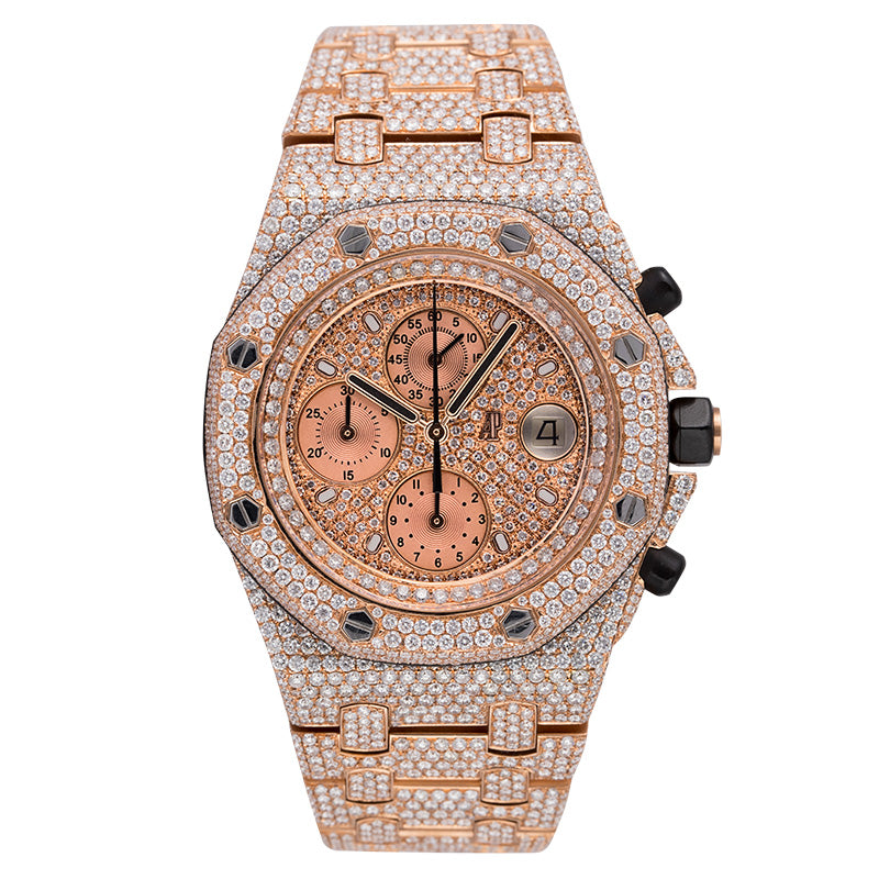 Luxury rose gold watch with diamond-studded bezel on a white background
