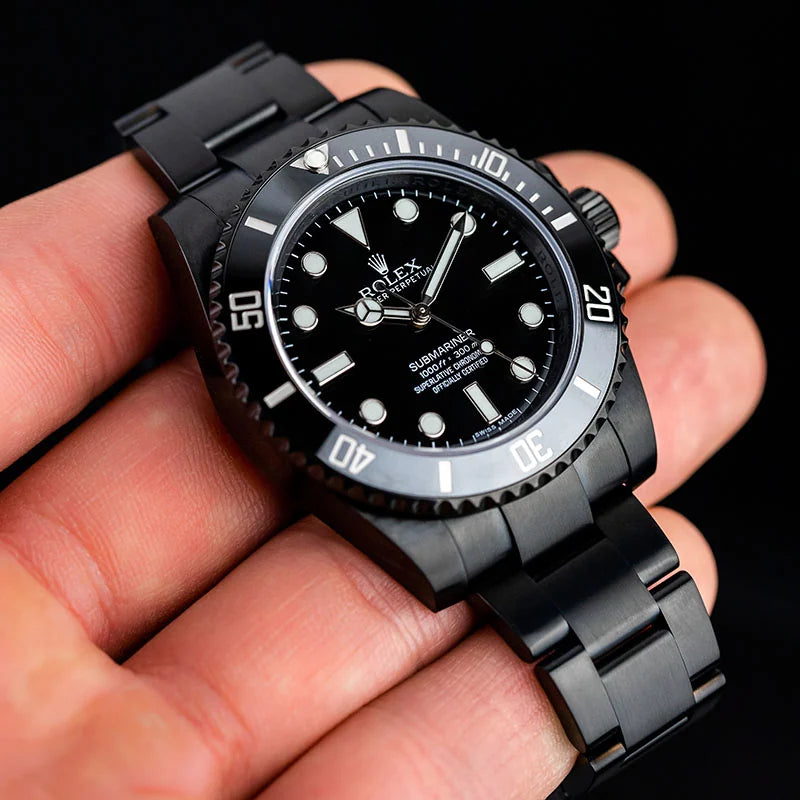 Custom Black PVD Rolex Submariner with Black Dial 114060 in hand
