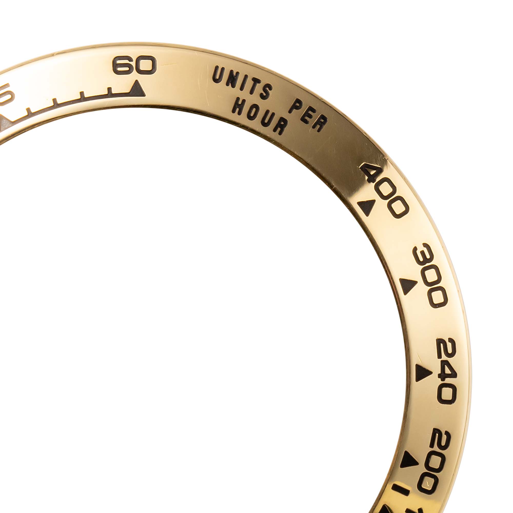 Close up of a Factory Yellow Gold Bezel for Rolex Daytona