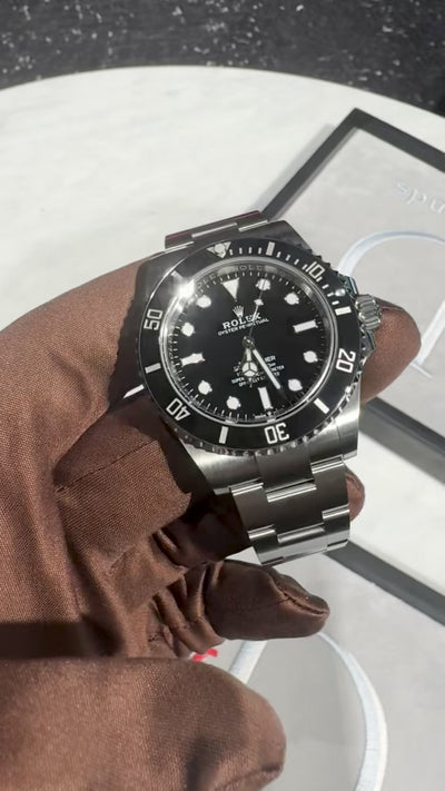 Preview video of Rolex Submariner 124060 with black dial and stainless steel case.