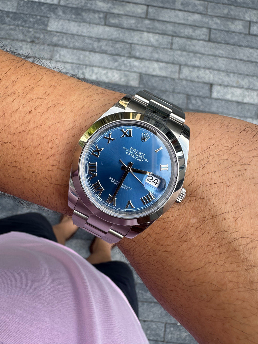 wrist roll of the Rolex Datejust 41 Steel Azzurro Blue Dial Oyster 126300